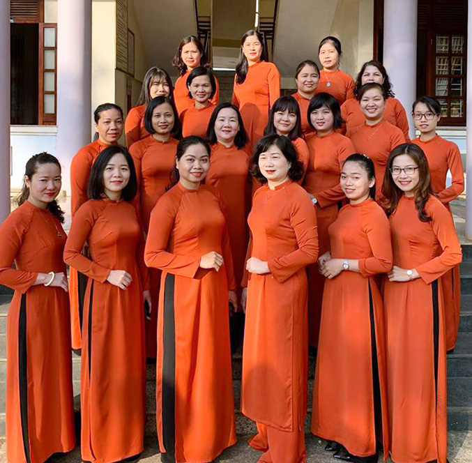 Áo dài đồng phục màu cam